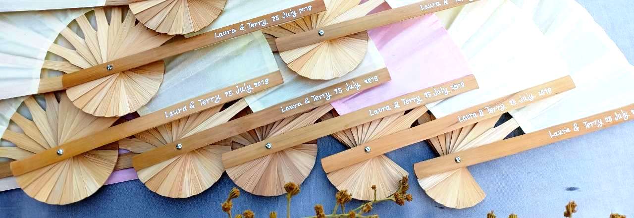 Hand painted names & date on the bamboo wedding fan handle