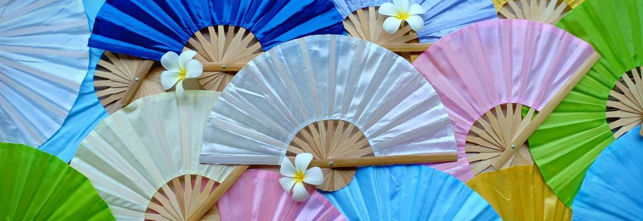 Solid color silky fabric wedding fans in assorted colors