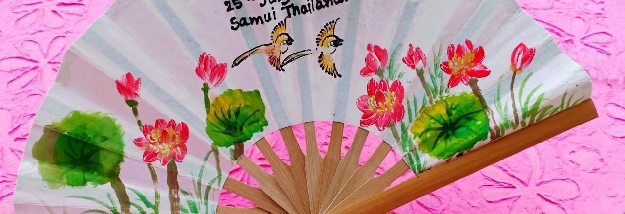 Name, date and place hand painted on the bamboo wedding fan body