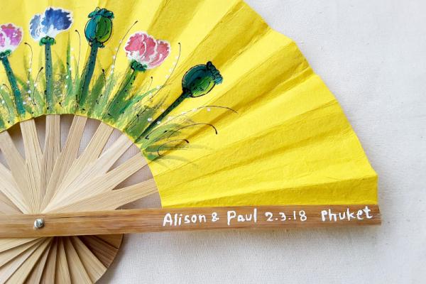 Wedding fan personalized with hand painted names and date.